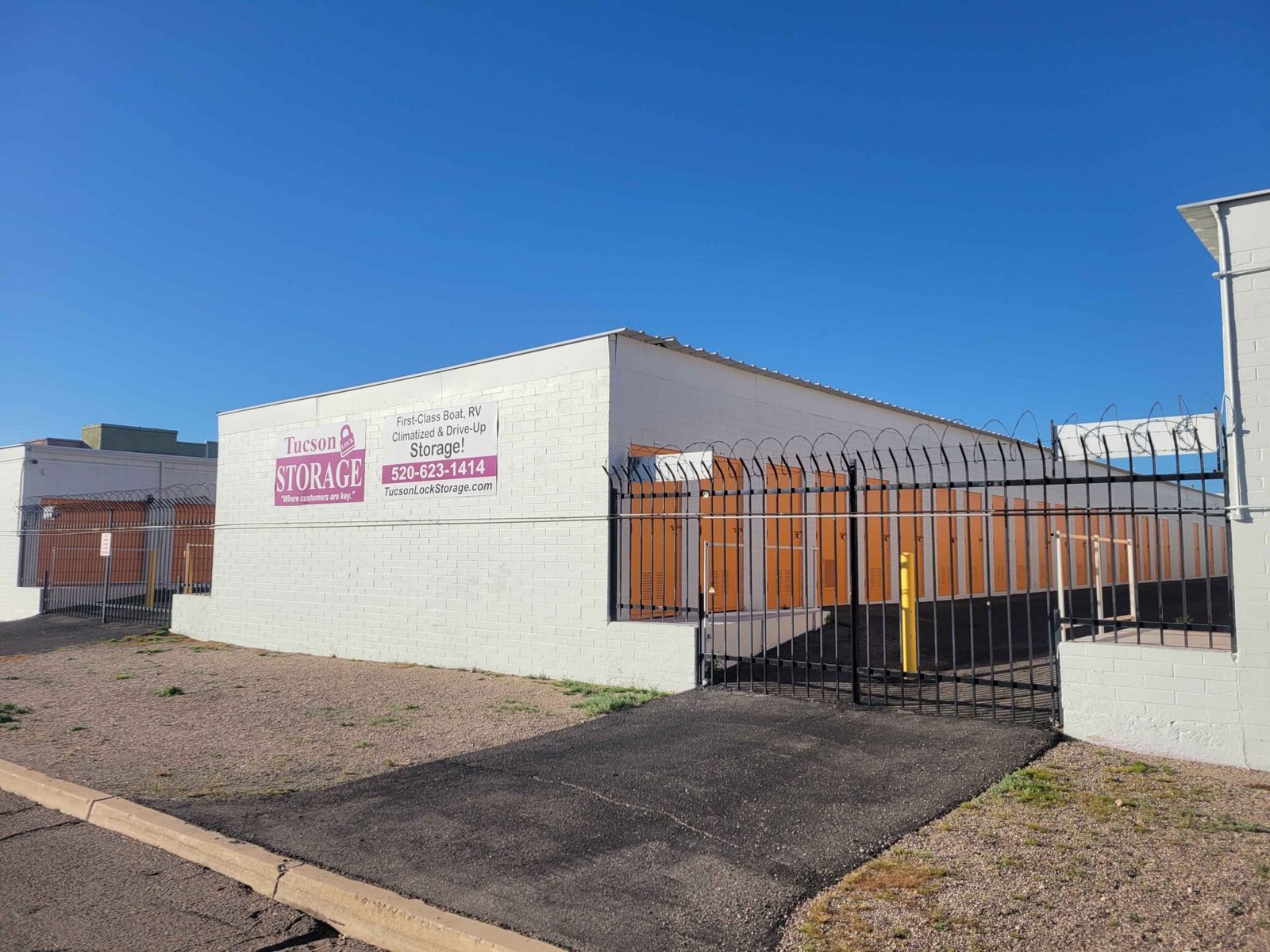 Well-kept exterior unit row at the Tucson storage facility